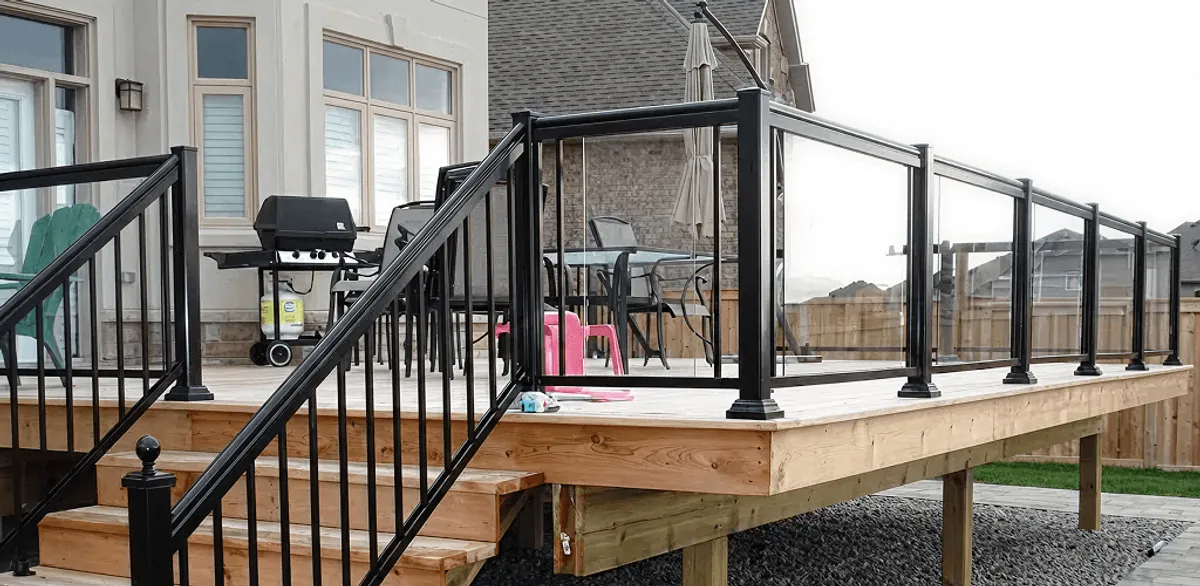 Handrail installation on a deck staircase for safety and code compliance in New Orleans, LA