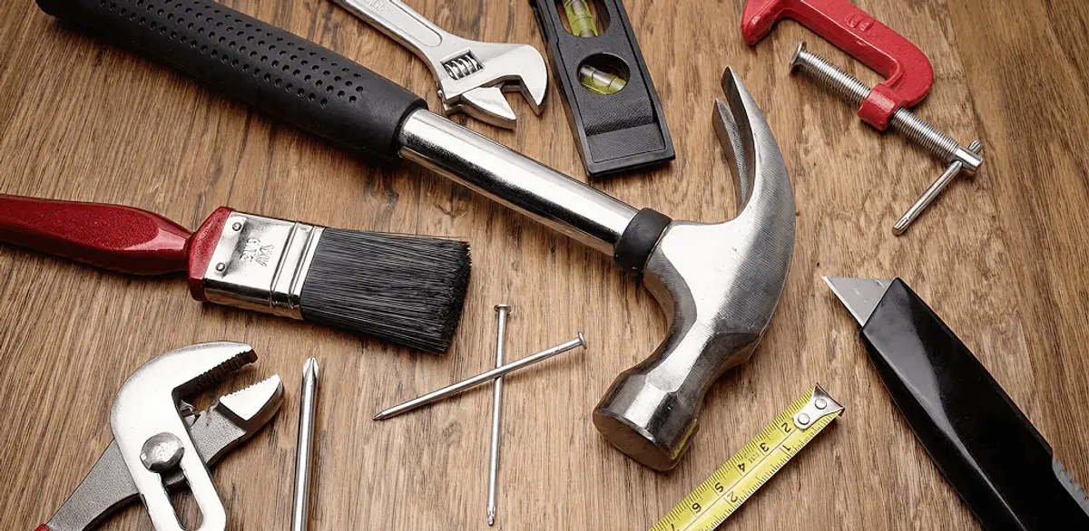 Handyman tools laid out for home repair and maintenance work in New Orleans, LA