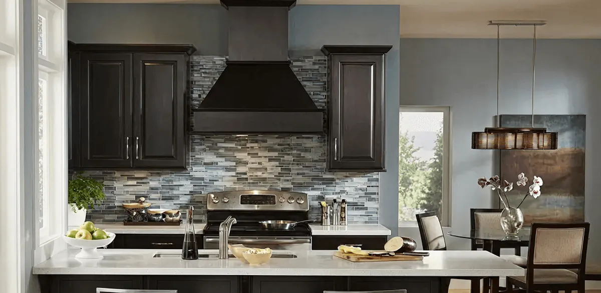 Kitchen cabinet painting and refinishing in a modern kitchen in New Orleans, LA